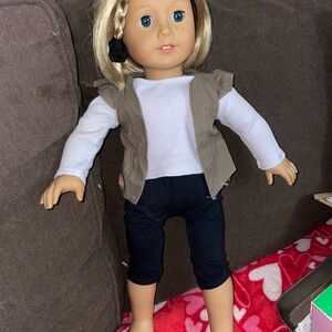 American Girl Blonde Doll in White Top, Black Pants, and Tan Vest